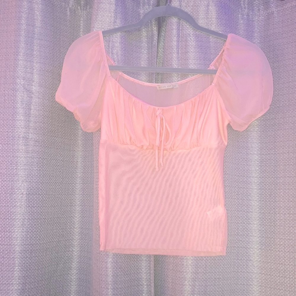 Brand “Active USA” color peach, size small, okay condition.